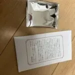 「写真の説明」　花まつりの祭壇の写真。中心にお釈迦様が居ます。